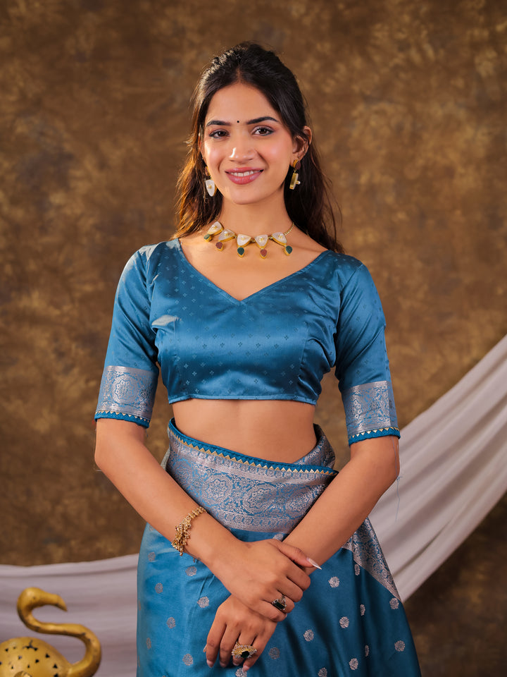 Turquoise Blue Kanjivaram Banarasi Satin Silk Saree with Antique Silver Zari Weaving, Rich Heritage Pallu & Tassel Detailing