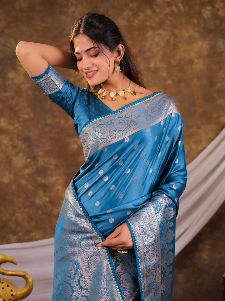 Turquoise Blue Kanjivaram Banarasi Satin Silk Saree with Antique Silver Zari Weaving, Rich Heritage Pallu & Tassel Detailing