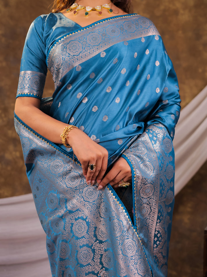 Turquoise Blue Kanjivaram Banarasi Satin Silk Saree with Antique Silver Zari Weaving, Rich Heritage Pallu & Tassel Detailing