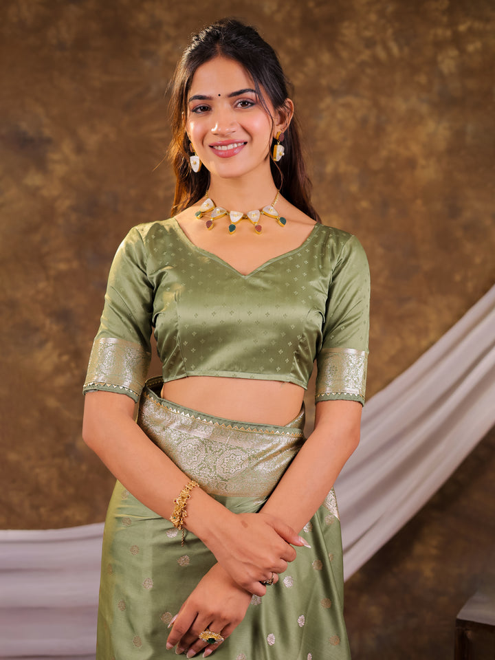 Sage Green Kanjivaram Banarasi Satin Silk Saree with Antique Silver Zari Weaving, Rich Heritage Pallu & Tassel Detailing