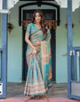 Teal Green Handloom Cotton Saree with Floral Print & Royal Bridal Procession Pallu