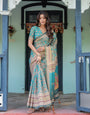 Teal Green Handloom Cotton Saree with Floral Print & Royal Bridal Procession Pallu