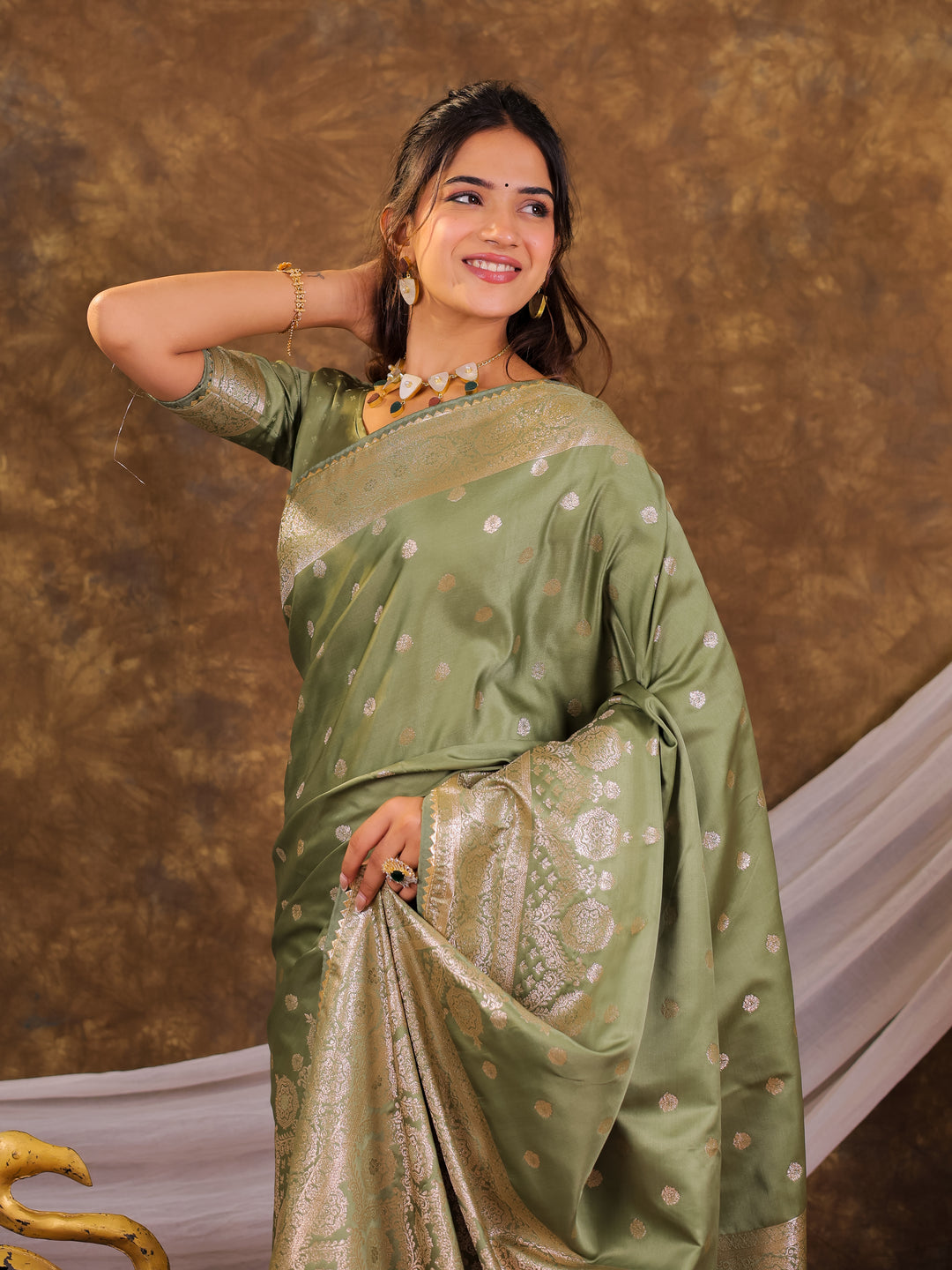 Sage Green Kanjivaram Banarasi Satin Silk Saree with Antique Silver Zari Weaving, Rich Heritage Pallu & Tassel Detailing