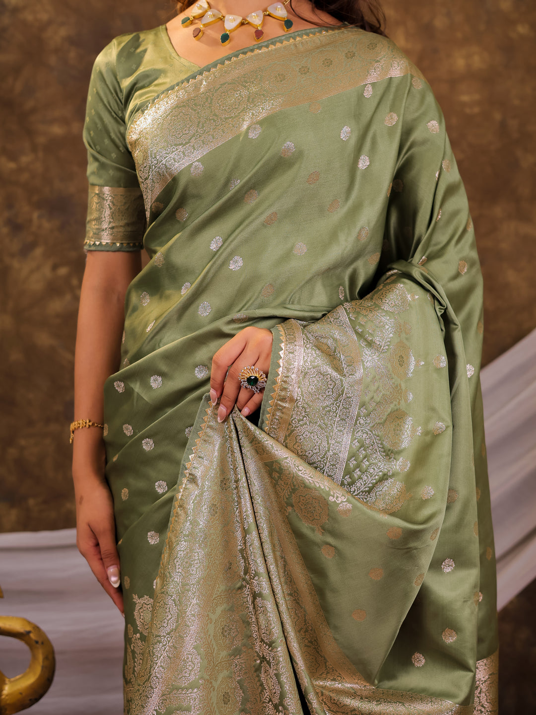 Sage Green Kanjivaram Banarasi Satin Silk Saree with Antique Silver Zari Weaving, Rich Heritage Pallu & Tassel Detailing
