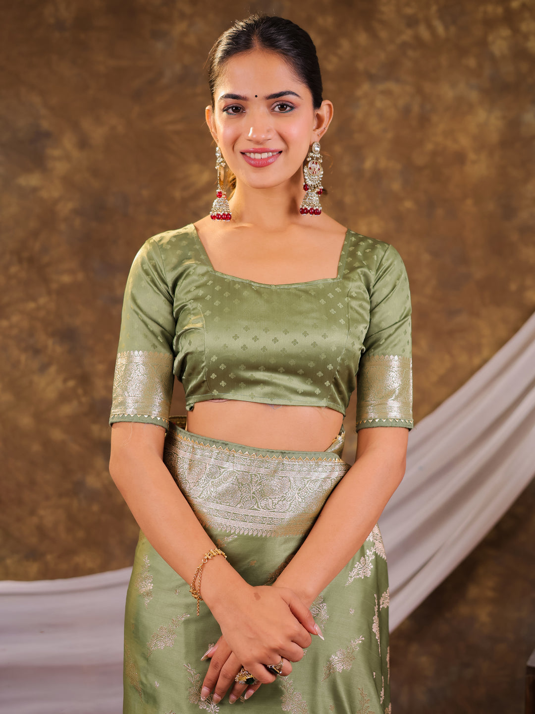 Sage Green Kanjivaram Banarasi Satin Silk Saree with Silver Zari Weaving, Designer Woven Pallu & Tassel Detailing