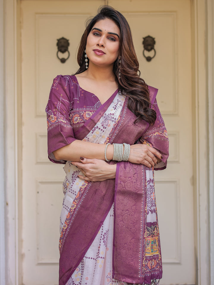 Wine Purple Handloom Cotton Printed Saree with Floral Panel Pallu, Ornamental Border & Tassels – Festive Ethnic Wear