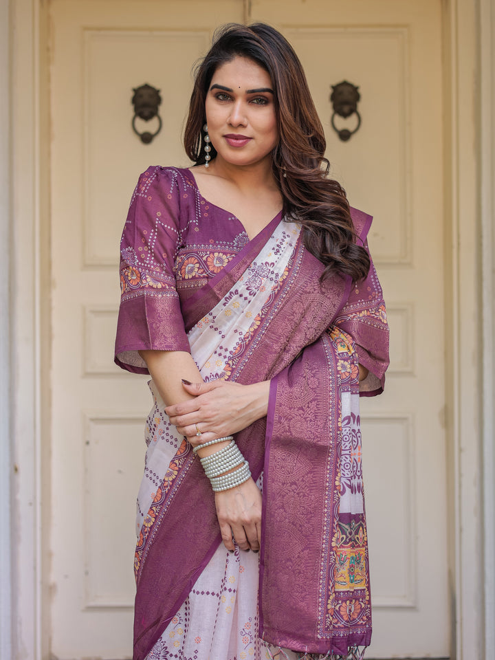 Wine Purple Handloom Cotton Printed Saree with Floral Panel Pallu, Ornamental Border & Tassels – Festive Ethnic Wear