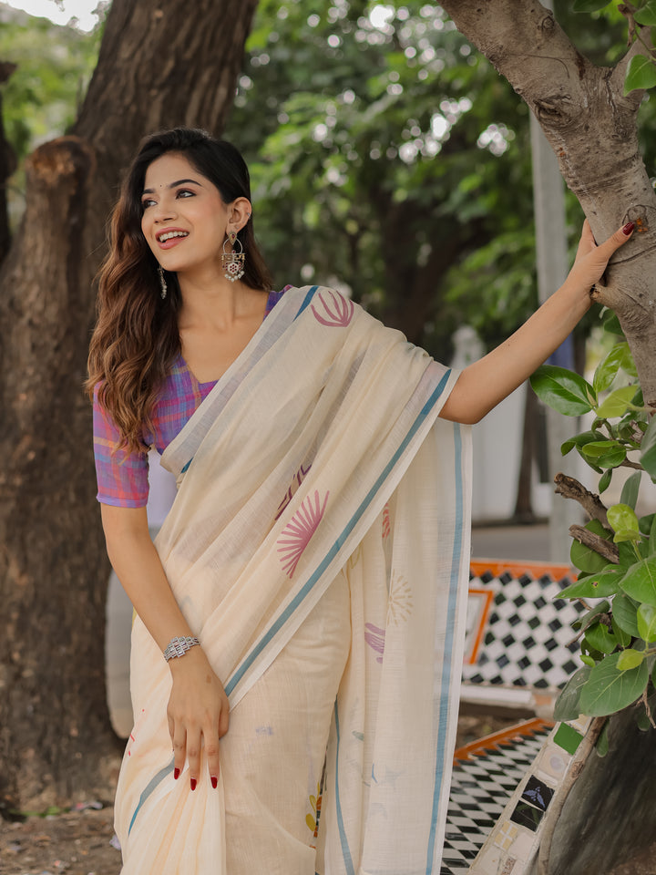 Ivory Mul Cotton Printed Saree for Women with Multicolor Abstract Motifs, Blue Border & Tassels | Soft Daily & Office Wear