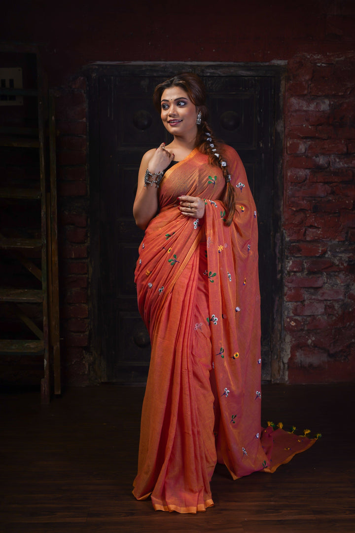 Title: Rust Orange Mul Cotton Saree with Multicolour Floral Motifs & Elegant Woven Border