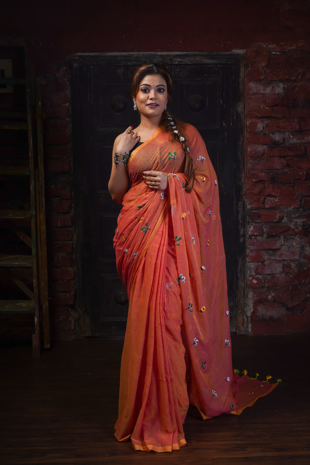 Title: Rust Orange Mul Cotton Saree with Multicolour Floral Motifs & Elegant Woven Border