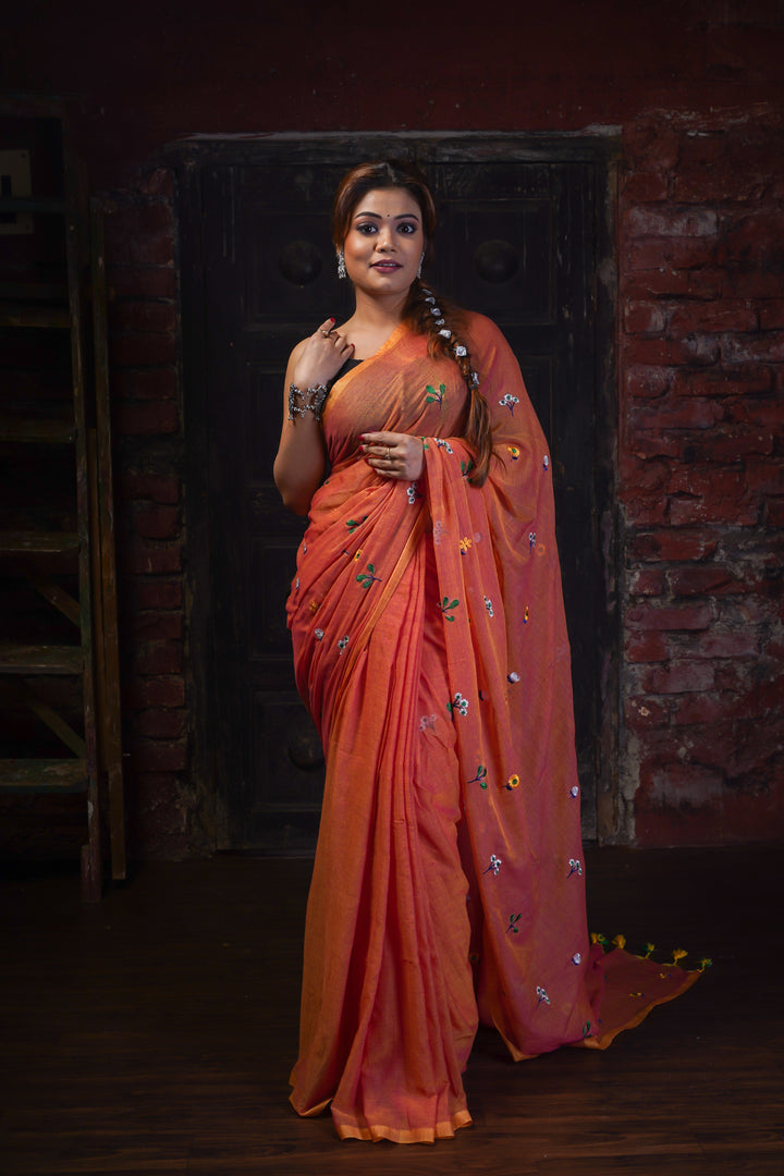 Title: Rust Orange Mul Cotton Saree with Multicolour Floral Motifs & Elegant Woven Border