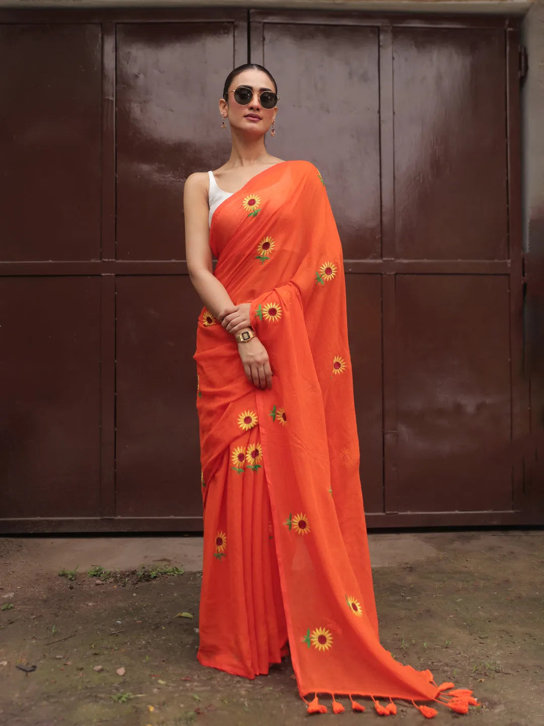 Vibrant Orange Mul Cotton Saree with Sunflower Floral Embroidery & Tasselled Pallu