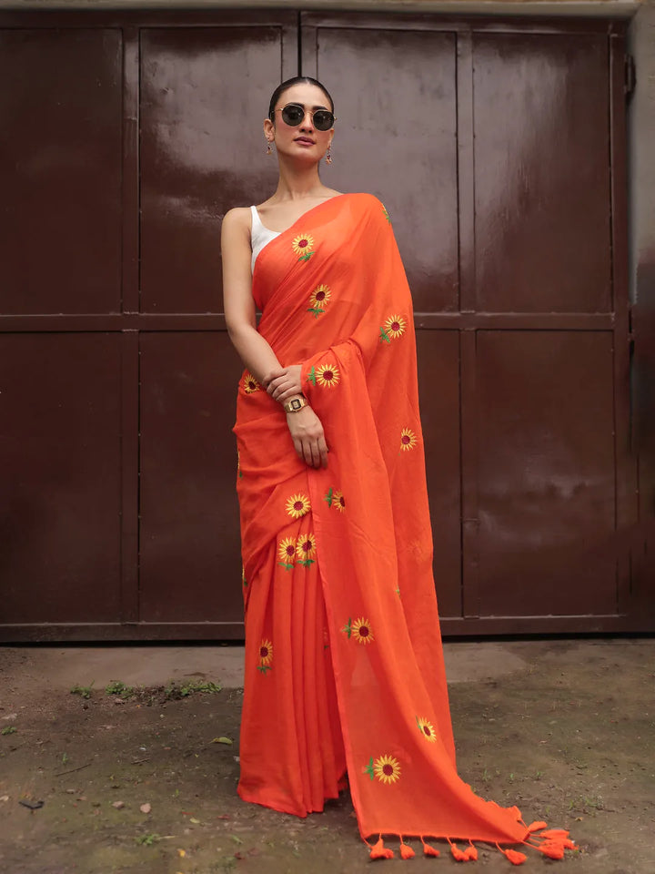 Vibrant Orange Mul Cotton Saree with Sunflower Floral Embroidery & Tasselled Pallu, Comes With Attached Blouse Piece