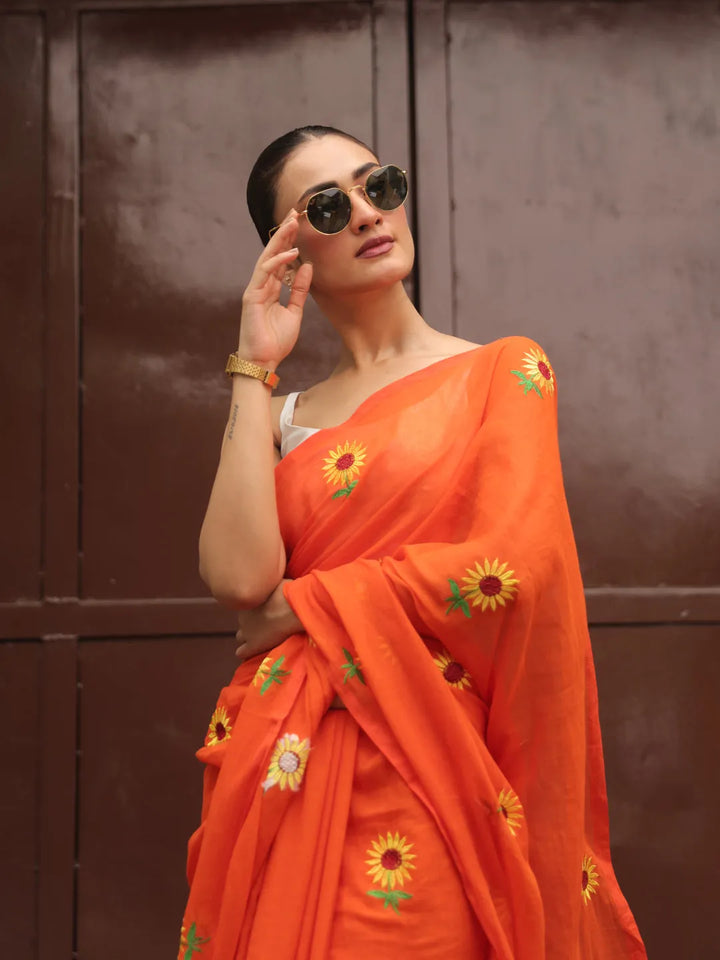 Vibrant Orange Mul Cotton Saree with Sunflower Floral Embroidery & Tasselled Pallu