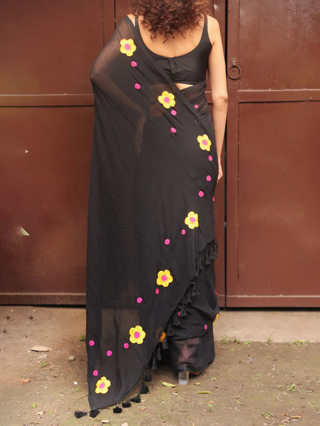 Black Mul Cotton Saree with Yellow & Pink Floral Appliqué and Tasselled Pallu