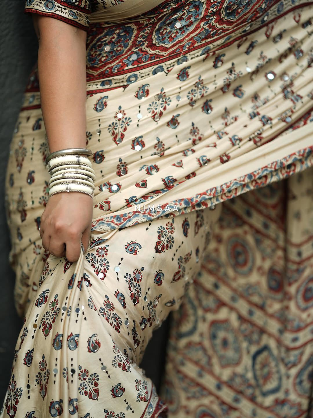 Ajrakh Chinnon Printed Saree with Tassel Detailing & Attached Blouse (No Mirror Work)