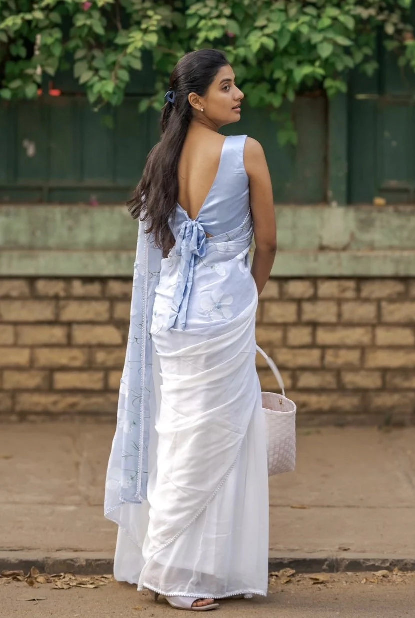 Sky Blue Pure Georgette Hand-Painted Saree with White Floral Motifs and Sequins | Modal Satin Blouse