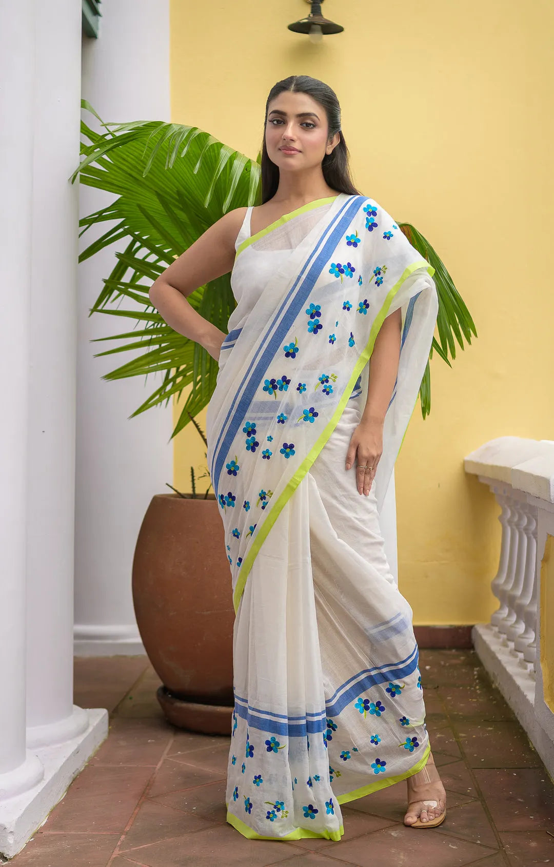 Ivory Mul Cotton Saree with Blue Floral Embroidery, Contrast Border & Tasselled Pallu