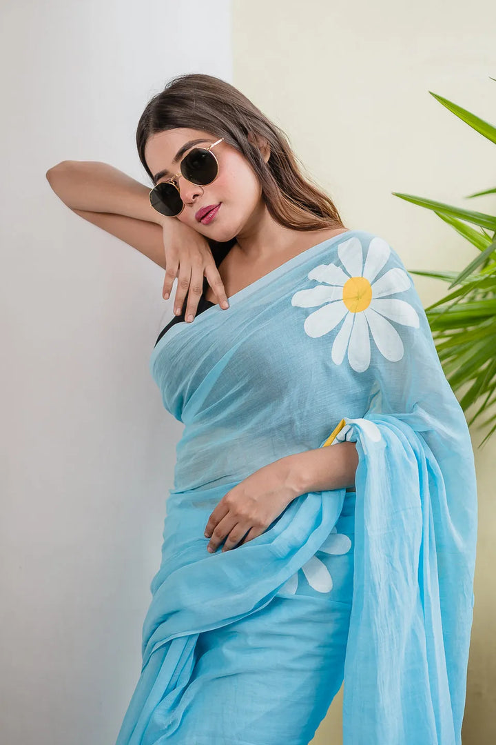 Sky Blue Mul Cotton Saree with Daisy Floral Print & Blue-White Tasselled Pallu