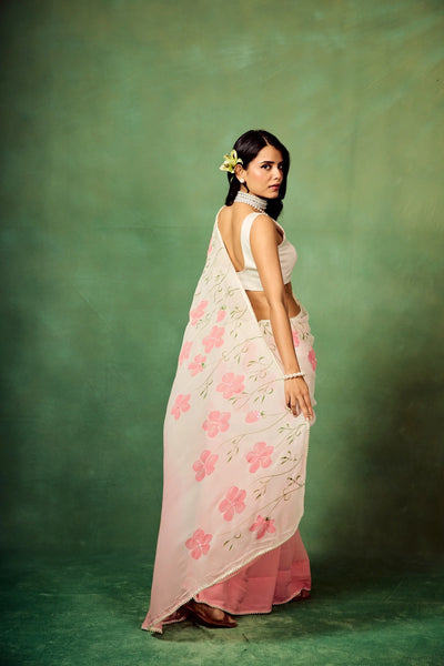 Blush Pink Pure Georgette Hand-Painted Floral Saree with White Motifs & Sequin Accents – Modal Satin Blouse