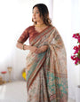 Beige & Green Handloom Cotton Saree with Village Life Print and Majestic Peacock Pallu