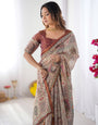 Beige & Maroon Handloom Cotton Saree with Royal Faces & Elephant Pallu Motif