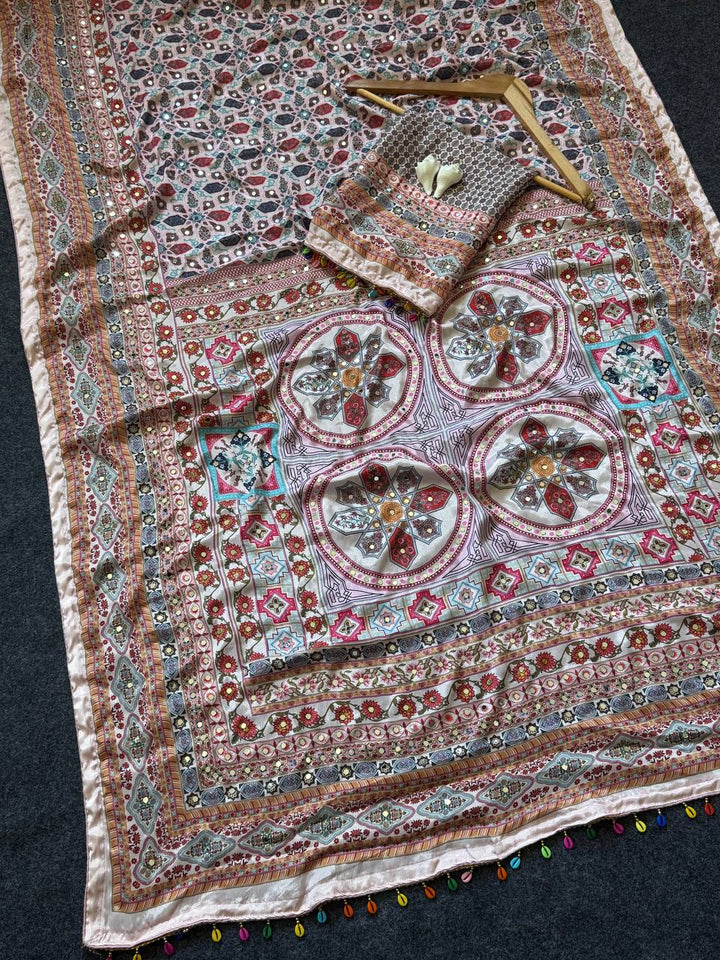 Dusty Rose Heritage Print Modal Silk Saree with Intricate Floral Motifs, Ornamental Pallu & Multicolor Tassel Detailing