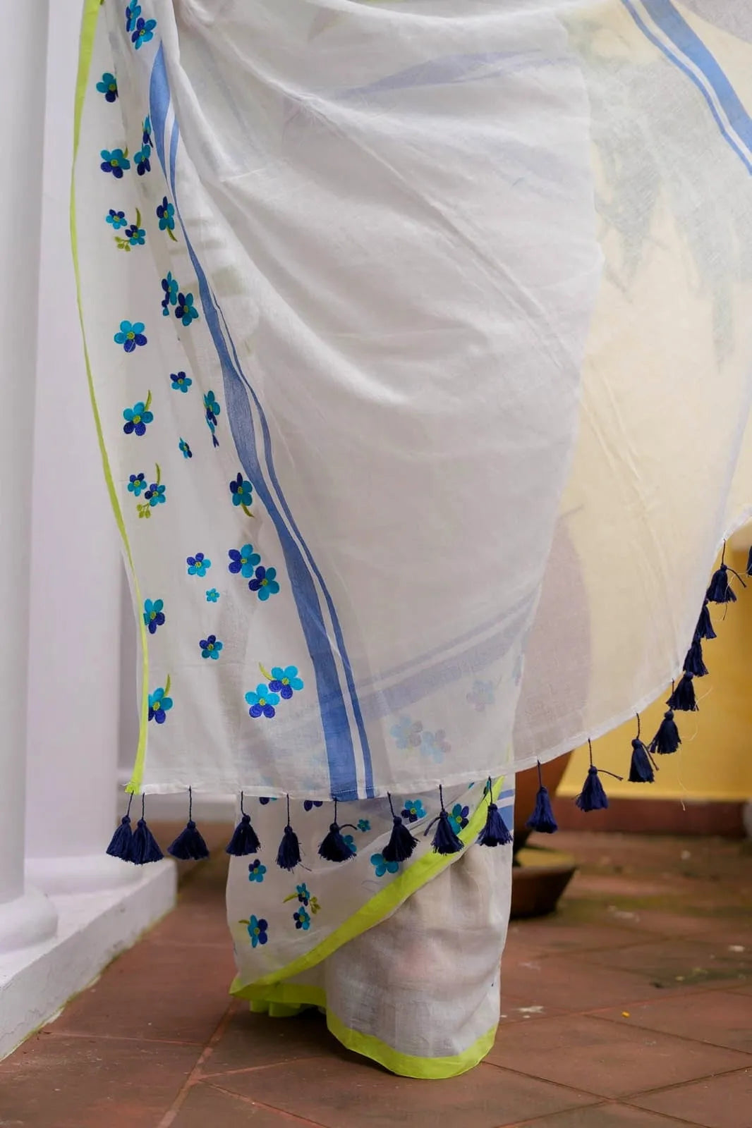 Ivory Mul Cotton Saree with Blue Floral Embroidery, Contrast Border & Tasselled Pallu