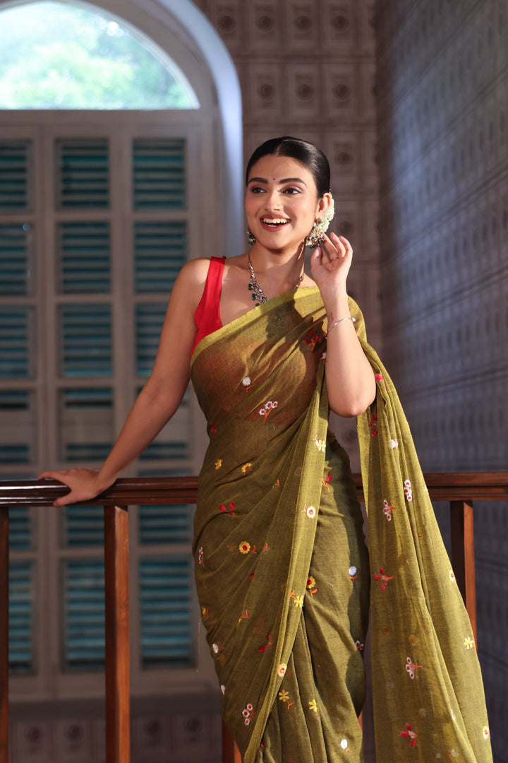 Olive Green Mul Cotton Saree with Multicolour Floral Motifs, Woven Border & Tassel Pallu