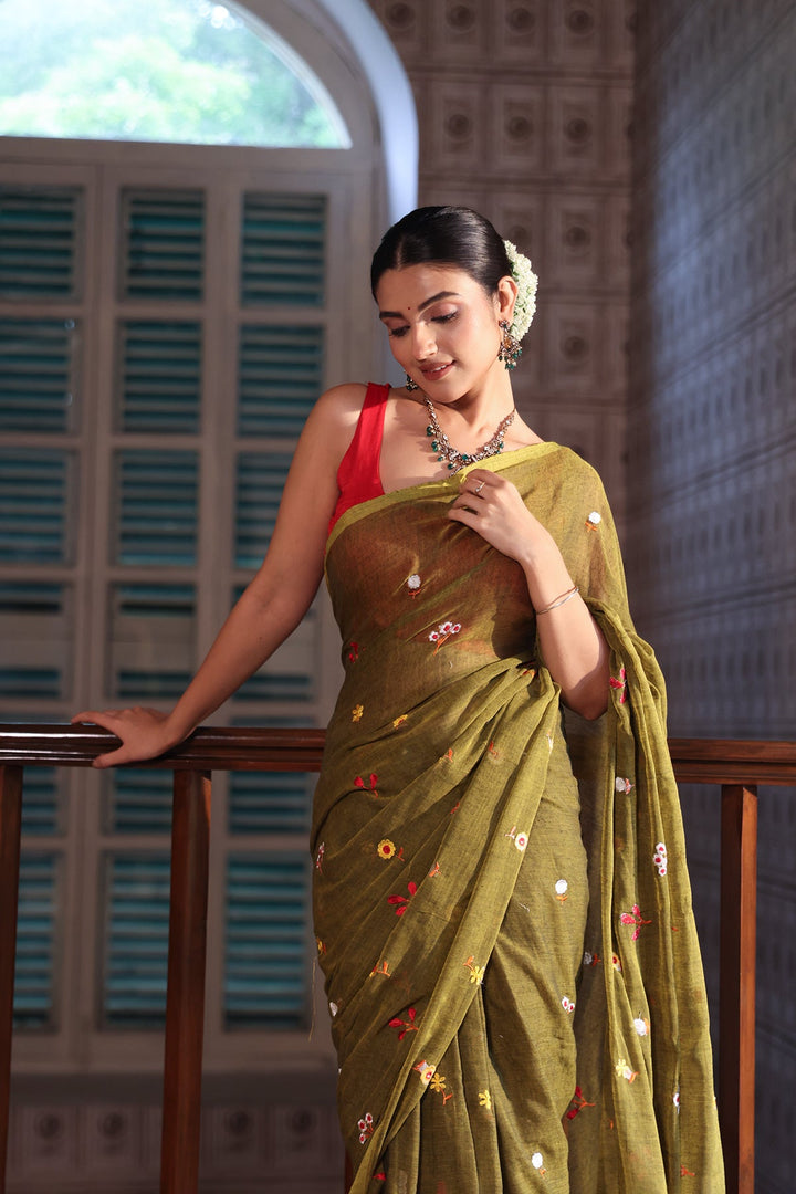 Olive Green Mul Cotton Saree with Multicolour Floral Motifs, Woven Border & Tassel Pallu