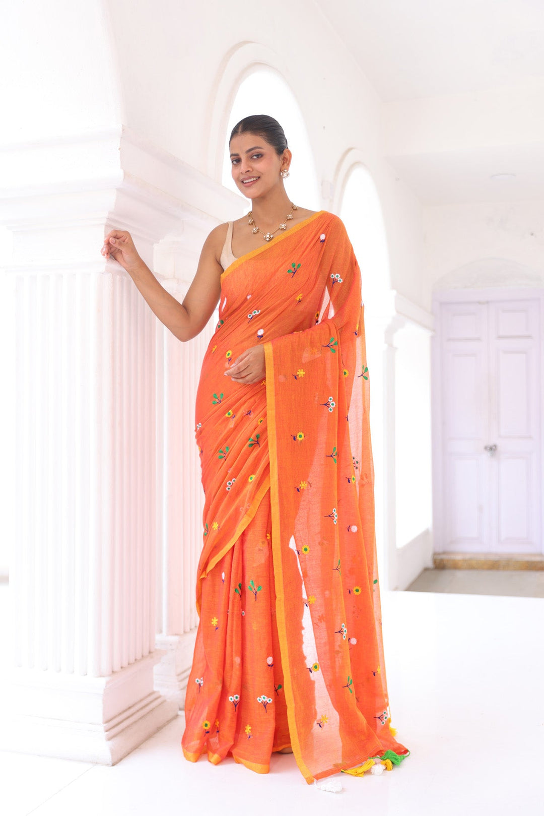 Rust Orange Mul Cotton Saree with Multicolour Floral Motifs & Elegant Woven Border