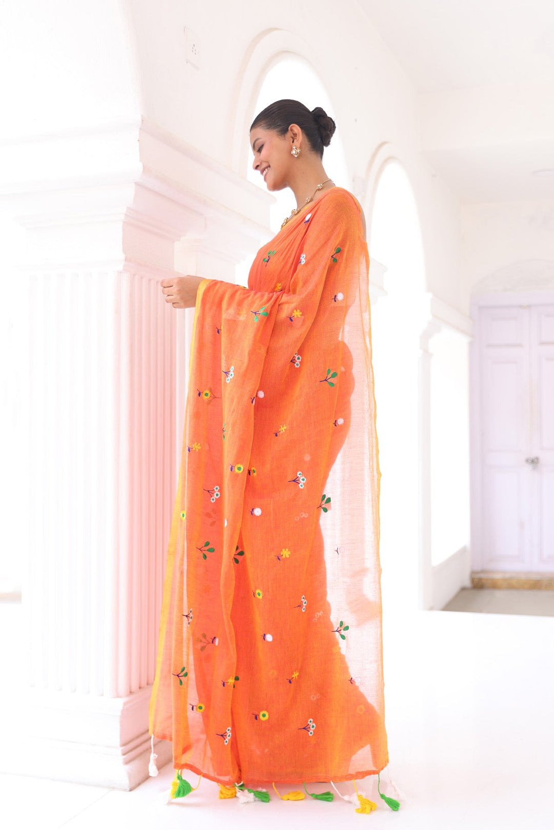 Rust Orange Mul Cotton Saree with Multicolour Floral Motifs & Elegant Woven Border