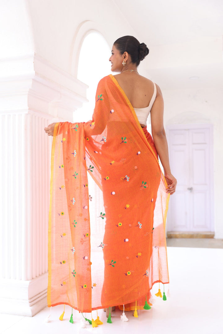 Rust Orange Mul Cotton Saree with Multicolour Floral Motifs & Elegant Woven Border