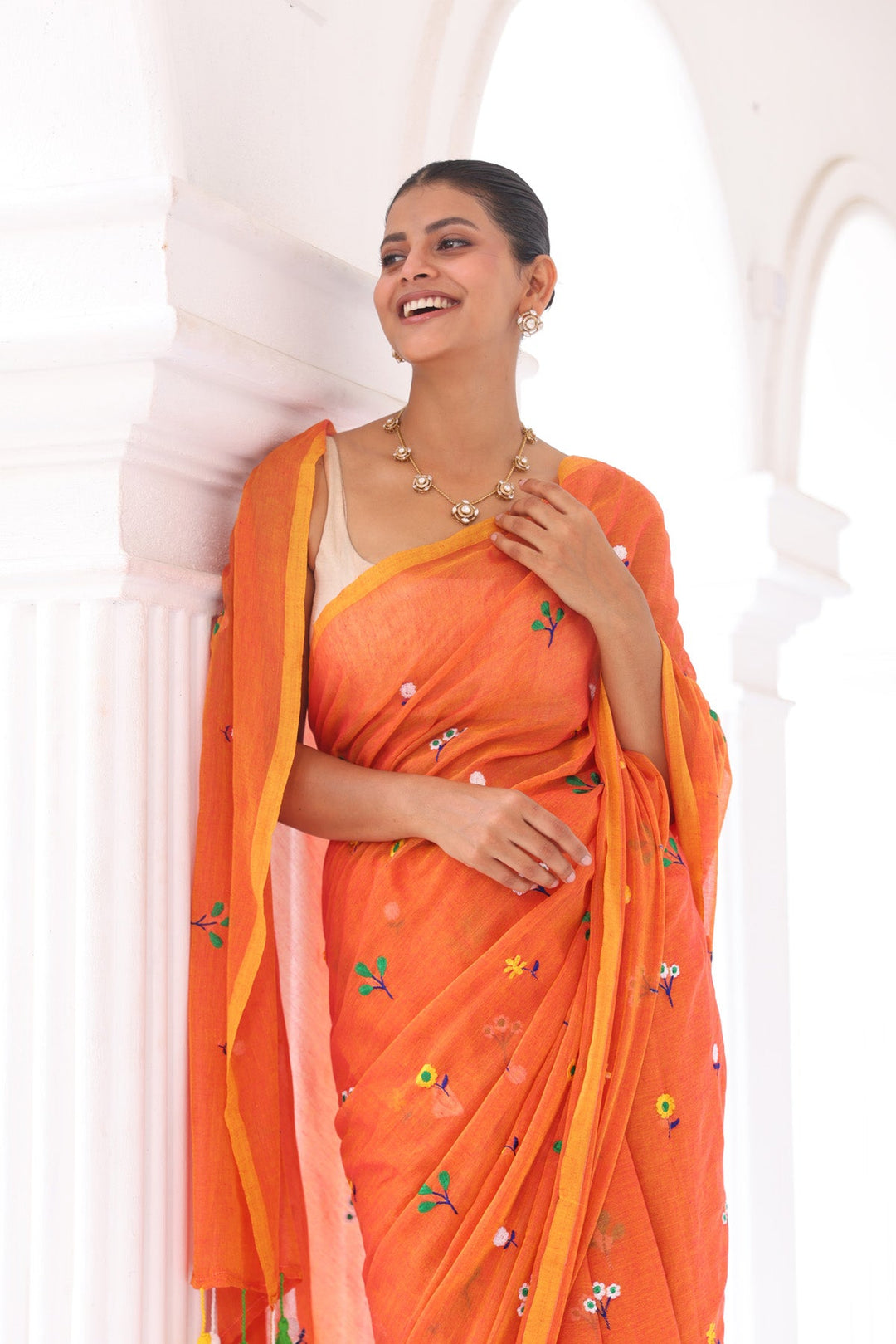 Rust Orange Mul Cotton Saree with Multicolour Floral Motifs & Elegant Woven Border